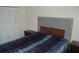 Bedroom with a large bed and natural light at 1644 Cypress Woods Cir, St Cloud, FL 34772