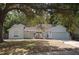 Charming single-story home featuring well-maintained landscaping and a cozy, inviting entrance at 1644 Cypress Woods Cir, St Cloud, FL 34772
