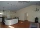 Bright and open living room with hardwood floors and stylish lighting at 1644 Cypress Woods Cir, St Cloud, FL 34772