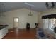 Spacious living room featuring an open floor plan and sliding glass doors at 1644 Cypress Woods Cir, St Cloud, FL 34772