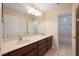 Bathroom featuring a large vanity with double sinks at 16500 Cedar Run Dr, Orlando, FL 32828