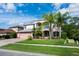 Charming two-story home with a well-manicured lawn and a two-car garage at 16500 Cedar Run Dr, Orlando, FL 32828