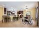 Open kitchen with stainless steel appliances, granite countertops, and a breakfast bar at 16500 Cedar Run Dr, Orlando, FL 32828
