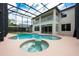 Backyard showcasing a sparkling pool, enclosed lanai, and covered patio at 16500 Cedar Run Dr, Orlando, FL 32828
