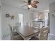 Dining area adjacent to the kitchen, decorated with coastal-themed accents at 1707 E Schwartz Blvd, Lady Lake, FL 32159