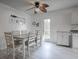 Cozy dining area with seating for six and a view of the outdoors at 1707 E Schwartz Blvd, Lady Lake, FL 32159