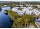Aerial view showing the community featuring a waterfront location, private docks, lush greenery and modern residences at 1764 Mondrian Cir, Winter Park, FL 32789