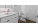 Clean, modern powder room with white vanity, quartz countertop, and minimalist fixtures at 1764 Mondrian Cir, Winter Park, FL 32789