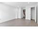 Bright bedroom with hardwood floors, closet and door to hallway with stairway at 1764 Mondrian Cir, Winter Park, FL 32789