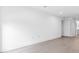 Minimalist bedroom with wood floors, neutral color palette, and ample natural light at 1764 Mondrian Cir, Winter Park, FL 32789
