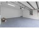 Well-lit garage with epoxy flooring, updated fixtures and plenty of space at 1764 Mondrian Cir, Winter Park, FL 32789
