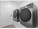 Well-equipped laundry room with a new washer and dryer at 1764 Mondrian Cir, Winter Park, FL 32789