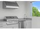 Outdoor kitchen featuring a stainless steel grill, granite countertops, and sleek cabinetry at 1764 Mondrian Cir, Winter Park, FL 32789