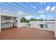 Expansive rooftop patio with an outdoor kitchen that offers tranquil lake and city views at 1764 Mondrian Cir, Winter Park, FL 32789