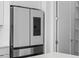 Modern refrigerator with stainless steel finish, ice maker, and sleek design next to a pantry door at 1764 Mondrian Cir, Winter Park, FL 32789
