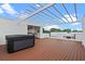 Relax on this rooftop deck with a hot tub, outdoor kitchen, and pergola, perfect for entertaining and enjoying the view at 1764 Mondrian Cir, Winter Park, FL 32789