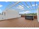 Unwind on this rooftop deck, complete with a hot tub, offering the ultimate space for relaxation and enjoyment at 1764 Mondrian Cir, Winter Park, FL 32789