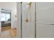 Walk-in shower stall with gold shower head and towel bar at 2624 Daulby St, Kissimmee, FL 34747