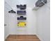 Walk-in closet with wire shelving for towels and linens at 2624 Daulby St, Kissimmee, FL 34747