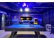 Finished basement offers a modern game room with pool table and laundry area at 2624 Daulby St, Kissimmee, FL 34747