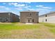 A spacious backyard offers plenty of room for outdoor activities and relaxation at 2932 Muller Oak Loop, Ocoee, FL 34761