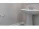 Pedestal sink with gray tile floor at 2932 Muller Oak Loop, Ocoee, FL 34761