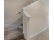 Staircase with a neutral color, carpeted steps and white trim at 2932 Muller Oak Loop, Ocoee, FL 34761