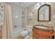 Bathroom showcasing a shower-tub combo and vintage vanity at 300 Carolina Ave # 304, Winter Park, FL 32789