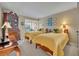 Bedroom featuring two twin beds, decor and large window at 300 Carolina Ave # 304, Winter Park, FL 32789