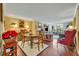 Elegant dining room featuring wood table, floral accents, and lots of light at 300 Carolina Ave # 304, Winter Park, FL 32789