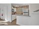 Efficient kitchen features stainless steel appliances and tiled backsplash at 300 Carolina Ave # 304, Winter Park, FL 32789