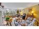 Cozy living room with fireplace, comfortable seating, and lots of natural light at 300 Carolina Ave # 304, Winter Park, FL 32789