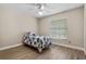 Bedroom with window view and wood floor at 3606 Palm Ave, Apopka, FL 32703