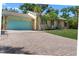 Inviting exterior view of home featuring a brick driveway and nicely manicured lawn at 3606 Palm Ave, Apopka, FL 32703