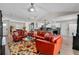 Bright, open-concept living room featuring stylish furniture, and seamless flow to the kitchen at 3606 Palm Ave, Apopka, FL 32703