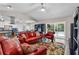 Open concept living room with access to the pool area, creating a perfect indoor-outdoor flow at 3606 Palm Ave, Apopka, FL 32703