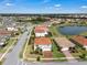 Aerial view of a neighborhood with water views and well-manicured lawns at 3966 Steer Beach Pl, Kissimmee, FL 34746