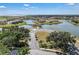 Aerial view of waterfront homes with docks and easy access to a large lake at 3966 Steer Beach Pl, Kissimmee, FL 34746