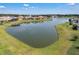 An aerial view of a community with lakefront homes, private docks, and scenic waterways at 3966 Steer Beach Pl, Kissimmee, FL 34746