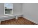 Windowed nook featuring hardwood floors and a clean interior at 3966 Steer Beach Pl, Kissimmee, FL 34746