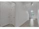Bright foyer with tile flooring, high ceilings, and decorative glass front door at 3966 Steer Beach Pl, Kissimmee, FL 34746