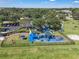 Community playground with swings, slides, and picnic tables at 3966 Steer Beach Pl, Kissimmee, FL 34746