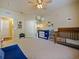 Charming bedroom with playful decor, ample space, and neutral carpet at 430 Southern Pecan Cir # 101, Winter Garden, FL 34787