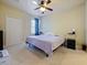 Calm bedroom featuring neutral decor, soft carpet, and a cozy atmosphere at 430 Southern Pecan Cir # 101, Winter Garden, FL 34787