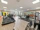 Well-equipped gym with treadmills, weights, and other exercise machines for fitness enthusiasts at 430 Southern Pecan Cir # 101, Winter Garden, FL 34787