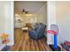 Inviting living room showcasing wood floors, seating, and natural light at 430 Southern Pecan Cir # 101, Winter Garden, FL 34787
