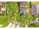Aerial view shows mature trees that provides ample shade to neighboring properties at 4448 Riverton Dr, Orlando, FL 32817