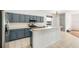 Kitchen with bar and stainless steel appliances at 4448 Riverton Dr, Orlando, FL 32817