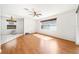 Spacious living area illuminated by natural light and complete with a ceiling fan at 4448 Riverton Dr, Orlando, FL 32817