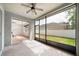A screened lanai provides an ideal spot for outdoor relaxation, with backyard views at 4448 Riverton Dr, Orlando, FL 32817